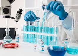Laboratory technician analyzing electroplating bath solution